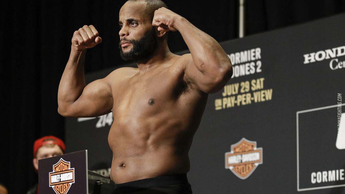 Daniel Cormier[7] (born March 20, 1979) is an American mixed martial artist and former Olympic wrestler. He is currently signed to Ultimate Fighting Championship (UFC), and is champion of both the light heavyweight and heavyweight divisions. As of August 28, 2018, he is the number 1 ranked Pound-for-Pound (P4P) fighter in the UFC.[8] Cormier is the second of two fighters in UFC history to hold titles in two weight classes simultaneously. Prior to the UFC, Cormier was Strikeforce Heavyweight Grand Prix Champion and King of the Cage Heavyweight Champion. He holds the distinction of having won a world championship belt in every promotion for which he has fought. Cormier is considered to be among the greatest mixed martial artists of all time.Source: https://en.wikipedia.org/wiki/Daniel_Cormier